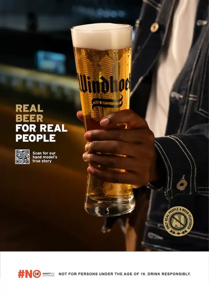 Nói không với quảng cáo AI, thương hiệu bia Windhoek chọn người mẫu có 6 ngón tay cho chiến dịch “100% thật”